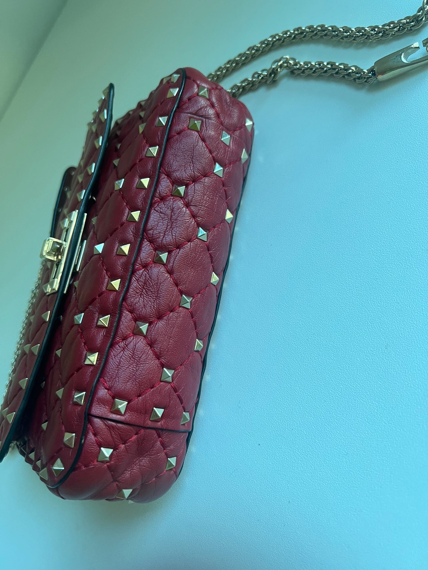 VALENTINO rockstud spike leather handbag in burgundy