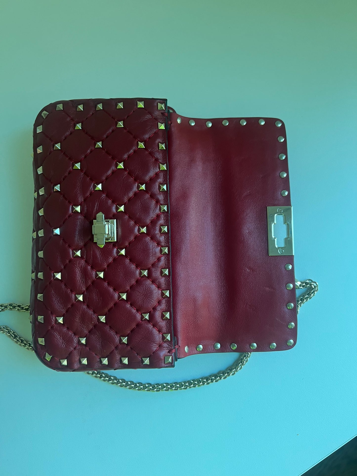 VALENTINO rockstud spike leather handbag in burgundy