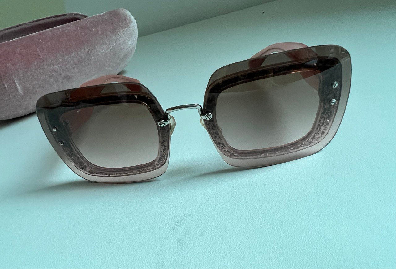 MIU MIU                               sunglasses