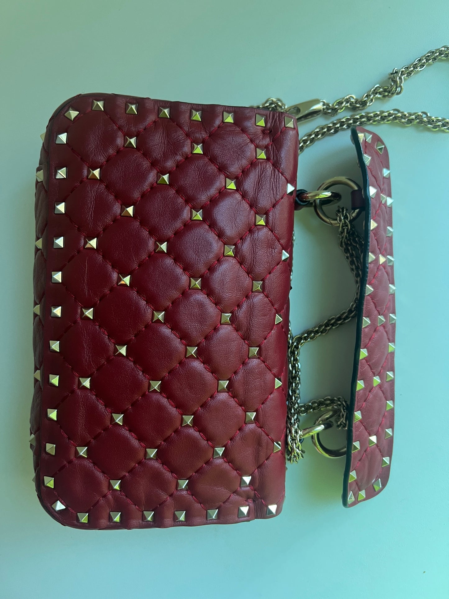 VALENTINO rockstud spike leather handbag in burgundy