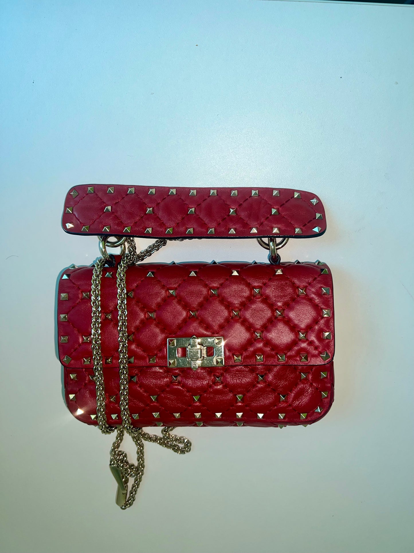 VALENTINO rockstud spike leather handbag in burgundy