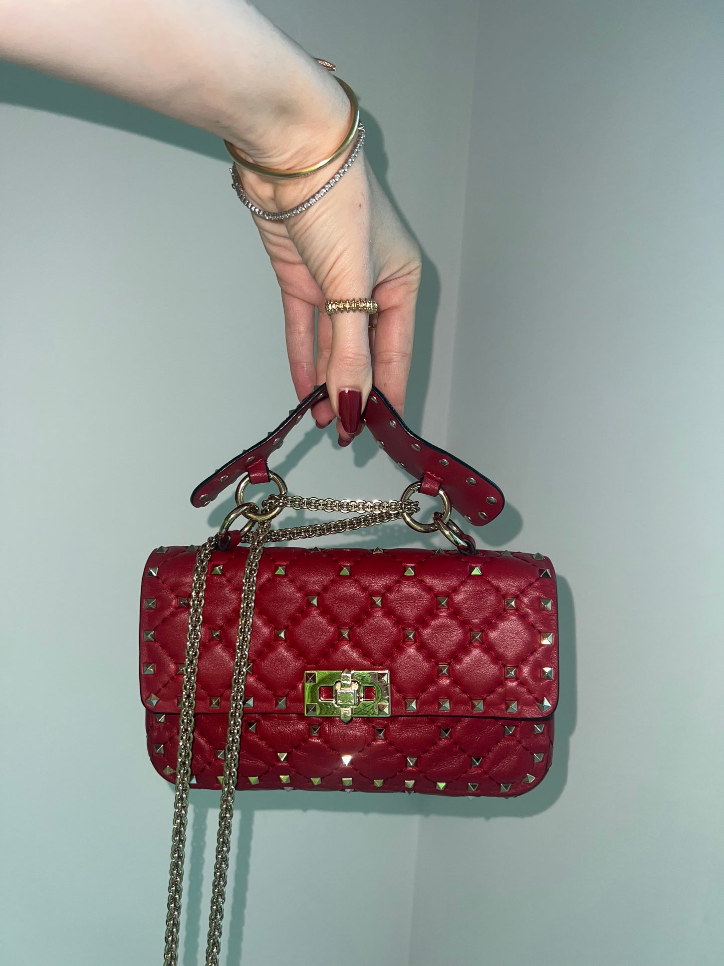 VALENTINO rockstud spike leather handbag in burgundy