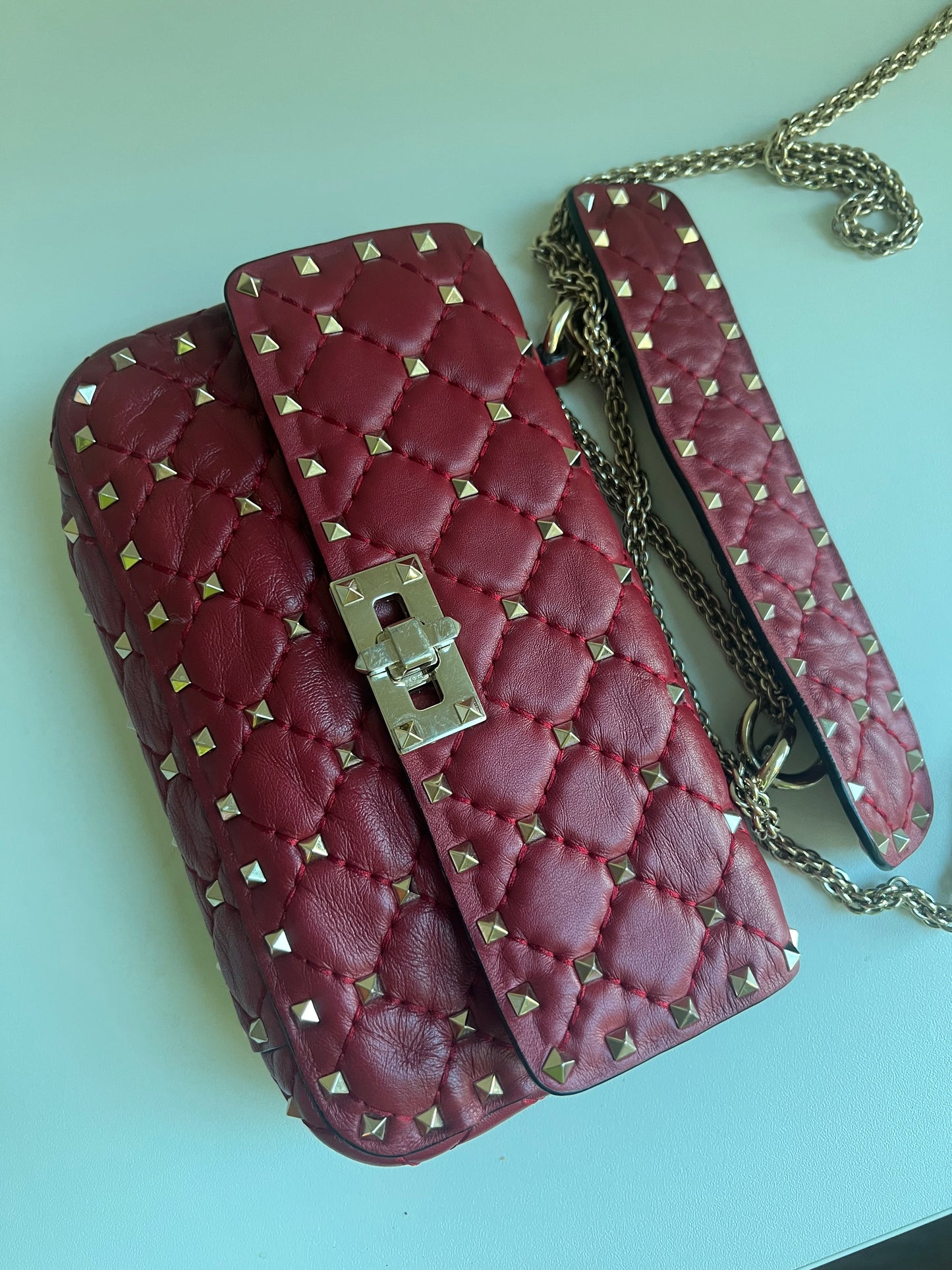 VALENTINO rockstud spike leather handbag in burgundy