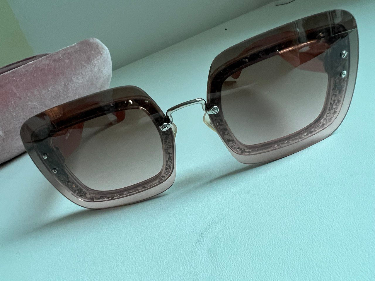 MIU MIU                               sunglasses